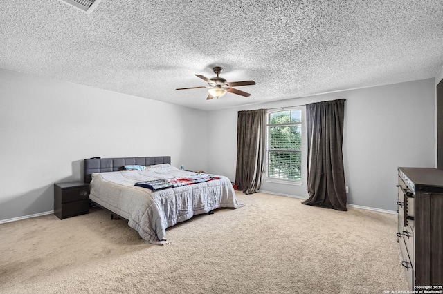 4838 Corian Spgs, San Antonio, TX 78247 - carpeted bedroom featuring ceiling fan, a textured ceiling, and baseboards