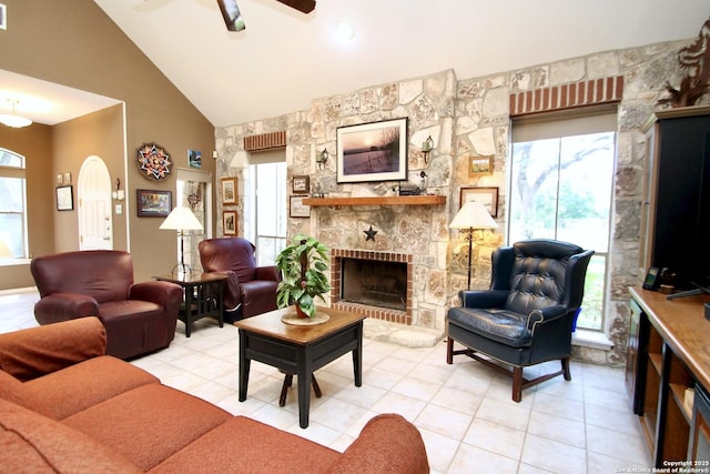 10020 Autumn Wood, Spring Branch, TX 78070 - living room with ceiling fan, a fireplace, light tile patterned floors, and high vaulted ceiling