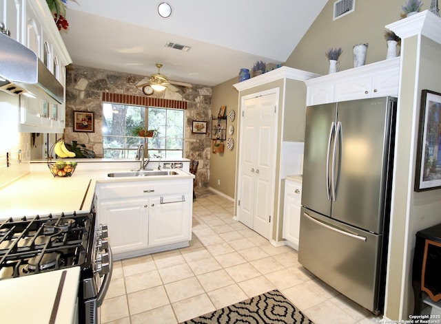10020 Autumn Wood, Spring Branch, TX 78070 - kitchen with stainless steel appliances, a sink, ceiling fan, light countertops, and white cabinets