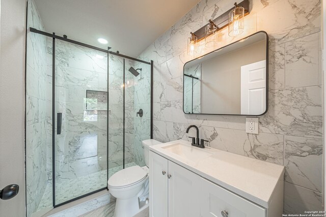4915 Clark, San Antonio, TX 78223 - bathroom featuring tile walls, a marble finish shower, toilet, vanity, and marble finish flooring
