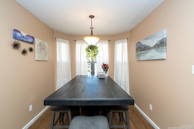 8013 County Road 128, Floresville, TX 78114 - game room with dark wood-style floors and baseboards