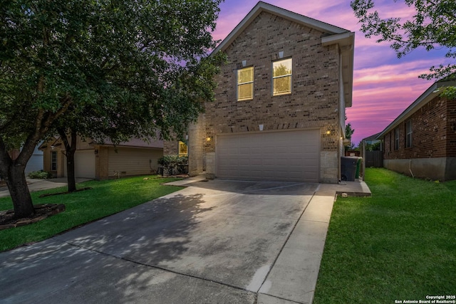 7326 Concerto Dr, San Antonio, TX 78266 - view of front of property featuring driveway, an attached garage, a front yard, brick siding, and stone siding