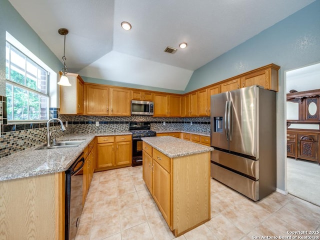 9411 Camino Venado, Helotes, TX 78023 - kitchen with black appliances, a sink, lofted ceiling, a center island, and light stone counters