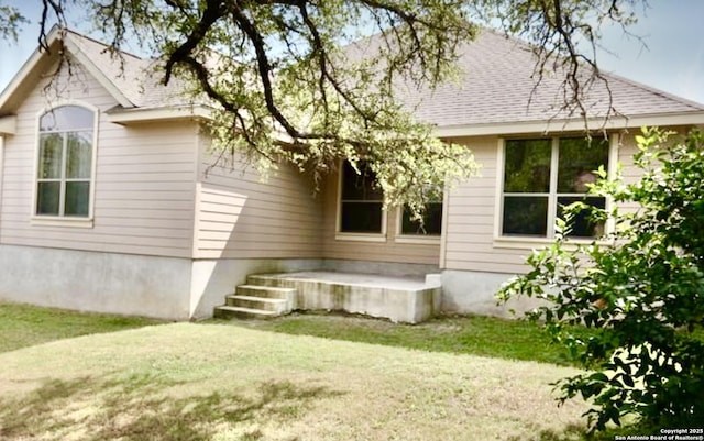 3526 Arroyo Grande, San Antonio, TX 78253 - back of house featuring a yard