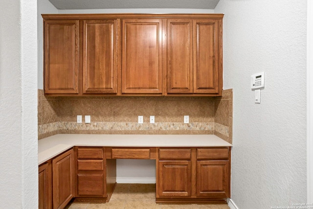 3526 Arroyo Grande, San Antonio, TX 78253 - kitchen featuring light countertops and brown cabinets