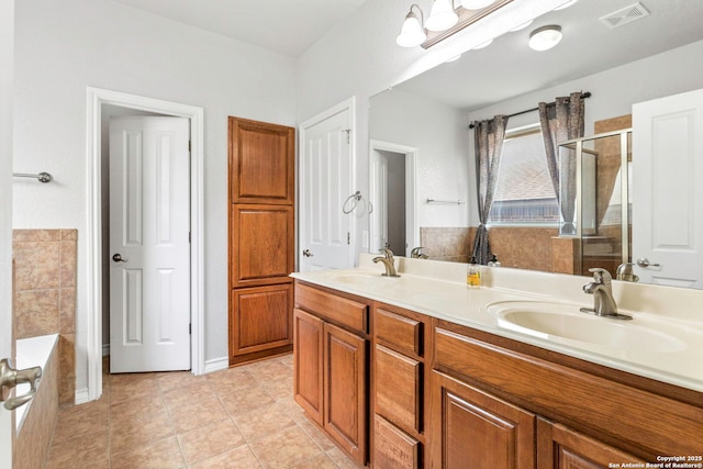 3526 Arroyo Grande, San Antonio, TX 78253 - full bath featuring a garden tub, double vanity, tile patterned floors, and a stall shower