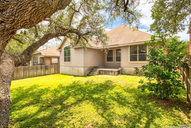 3526 Arroyo Grande, San Antonio, TX 78253 - rear view of property with a shingled roof
