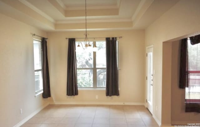 3526 Arroyo Grande, San Antonio, TX 78253 - unfurnished dining area featuring a raised ceiling, a chandelier, plenty of natural light, light tile patterned floors, and ornamental molding