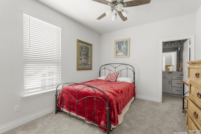 63 Ricadonna, San Antonio, TX 78253 - bedroom with carpet flooring, baseboards, connected bathroom, and a ceiling fan