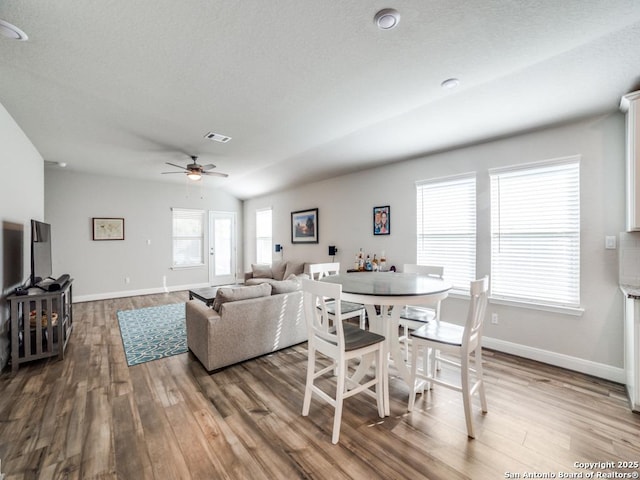 3075 Mondavi Crst, Schertz, TX 78154 - dining space featuring ceiling fan, wood finished floors, and baseboards