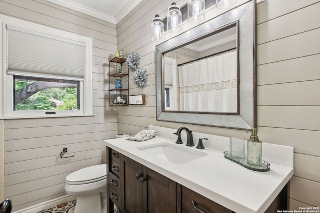 261 Fair Oaks, Alamo Heights, TX 78209 - full bathroom featuring ornamental molding, vanity, toilet, wooden walls, and a shower with shower curtain