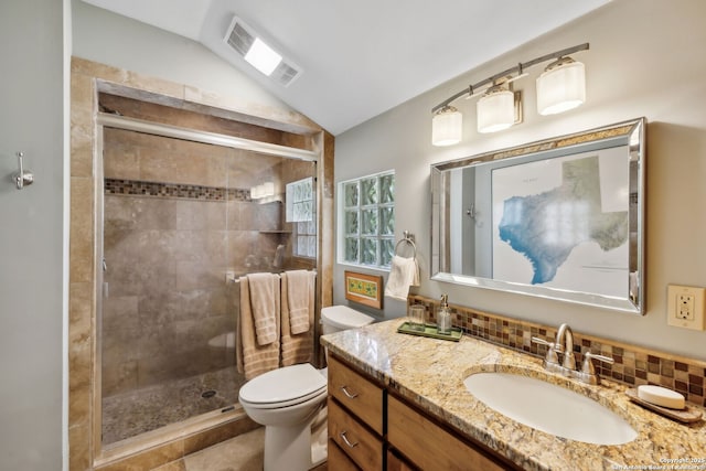 261 Fair Oaks, Alamo Heights, TX 78209 - full bath featuring vaulted ceiling, a shower stall, toilet, vanity, and backsplash