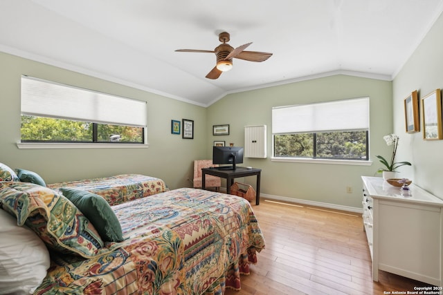 261 Fair Oaks, Alamo Heights, TX 78209 - bedroom with lofted ceiling, multiple windows, light wood-style flooring, crown molding, and ceiling fan
