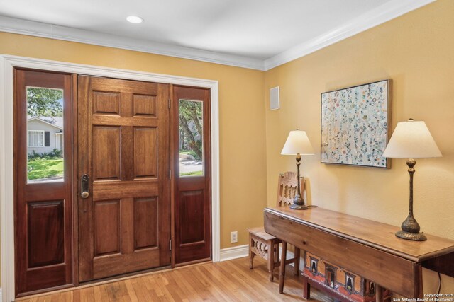 261 Fair Oaks, Alamo Heights, TX 78209 - foyer featuring light wood-style floors, baseboards, and ornamental molding