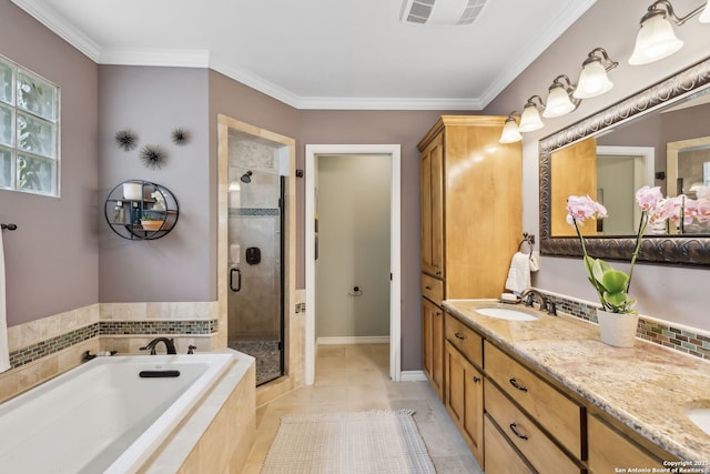 261 Fair Oaks, Alamo Heights, TX 78209 - bathroom with a garden tub, a stall shower, double vanity, tile patterned flooring, and ornamental molding