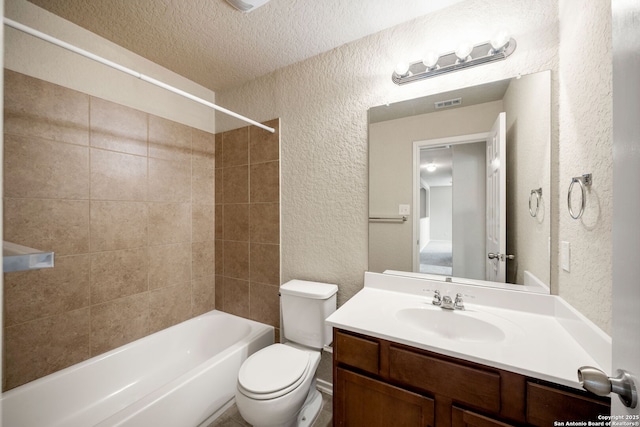 10438 Sun Ml, San Antonio, TX 78254 - bathroom with a textured wall, toilet, vanity, a textured ceiling, and shower / bath combination