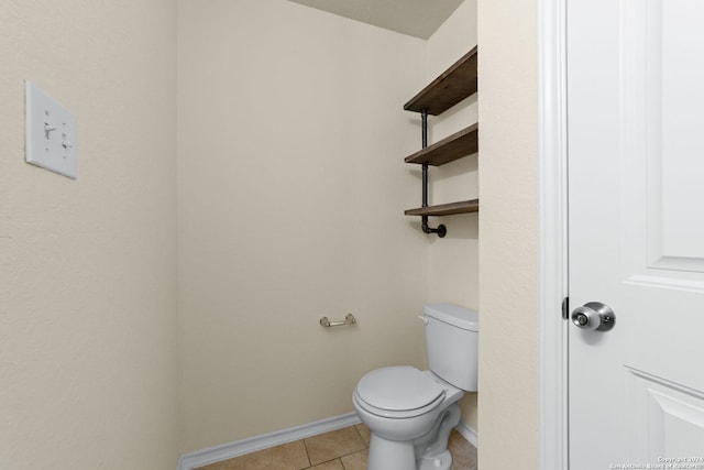 1407 Frio Eagle, San Antonio, TX 78245 - bathroom with tile patterned floors, toilet, and baseboards
