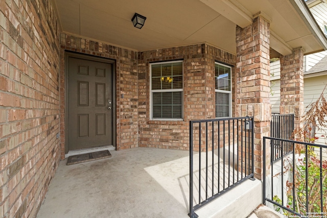 1407 Frio Eagle, San Antonio, TX 78245 - property entrance featuring covered porch and brick siding