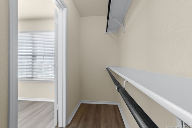 1407 Frio Eagle, San Antonio, TX 78245 - walk in closet featuring wood finished floors