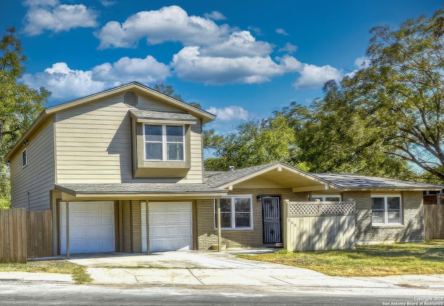 255 Gilbert Ln, San Antonio, TX 78213 - view of front of property featuring brick siding, fence, and a garage