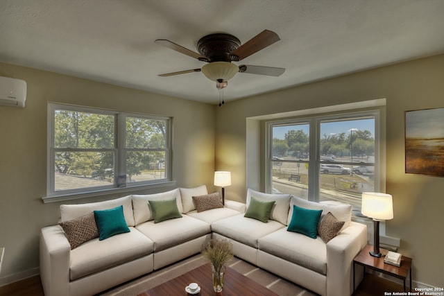 255 Gilbert Ln, San Antonio, TX 78213 - living room featuring healthy amount of natural light, ceiling fan, a wall unit AC, and baseboards