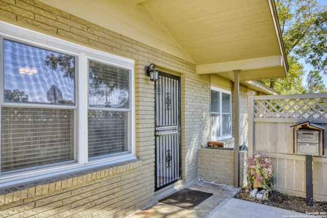 255 Gilbert Ln, San Antonio, TX 78213 - doorway to property featuring brick siding and fence
