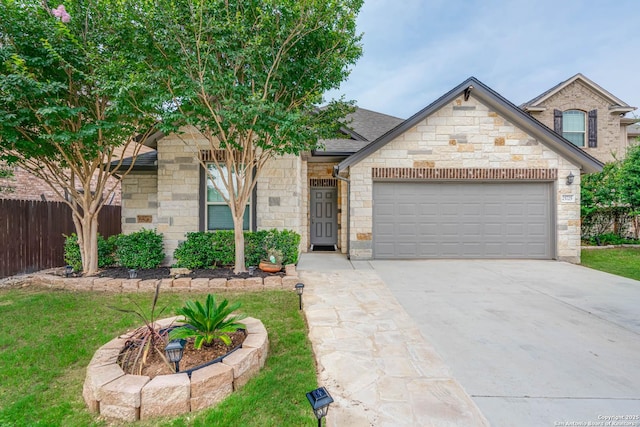25725 Two Spgs, San Antonio, TX 78255 - view of front of property with a garage, driveway, and stone siding