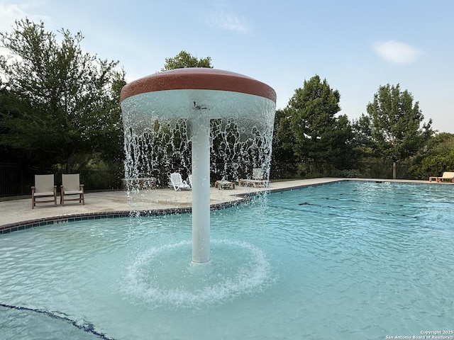 25725 Two Spgs, San Antonio, TX 78255 - community pool featuring a patio