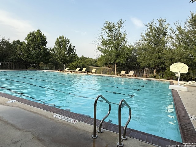 25725 Two Spgs, San Antonio, TX 78255 - community pool featuring fence and view of scattered trees
