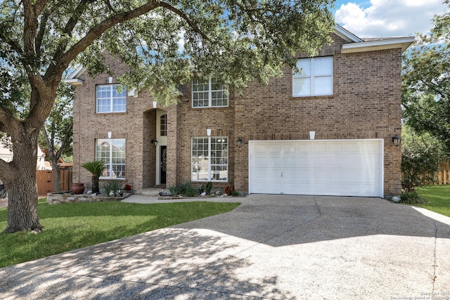 20607 Wild Spgs, San Antonio, TX 78258 - traditional home with driveway, a garage, and brick siding