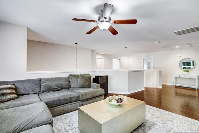 20607 Wild Spgs, San Antonio, TX 78258 - living area with attic access, a ceiling fan, wood finished floors, recessed lighting, and baseboards