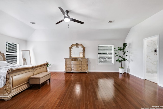 20607 Wild Spgs, San Antonio, TX 78258 - bedroom featuring vaulted ceiling, hardwood / wood-style floors, a heating unit, and baseboards