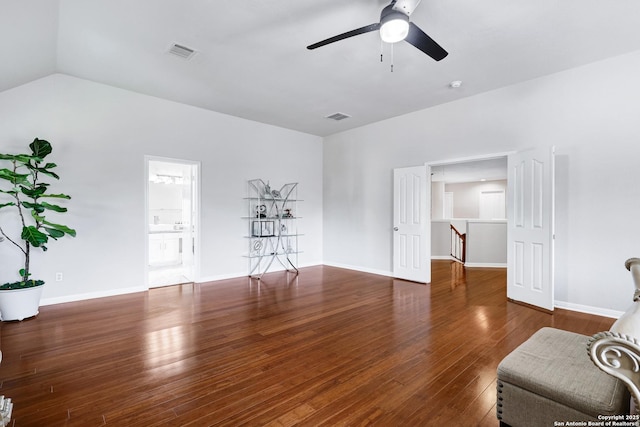 20607 Wild Spgs, San Antonio, TX 78258 - unfurnished living room with ceiling fan, wood finished floors, lofted ceiling, and baseboards