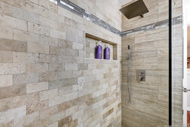 20607 Wild Spgs, San Antonio, TX 78258 - bathroom with tiled shower