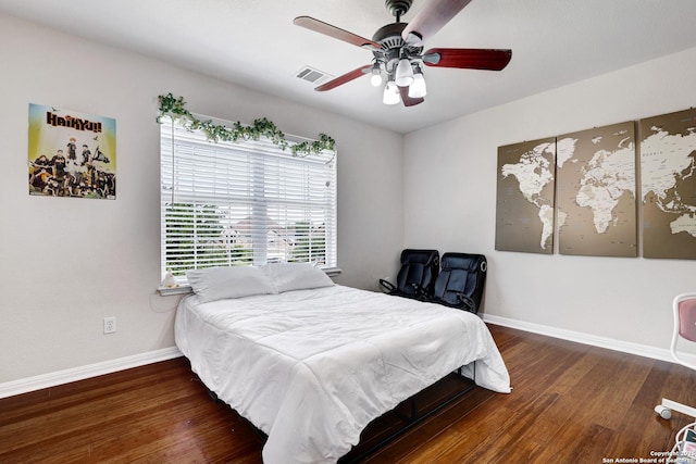 20607 Wild Spgs, San Antonio, TX 78258 - bedroom with baseboards, wood finished floors, and a ceiling fan