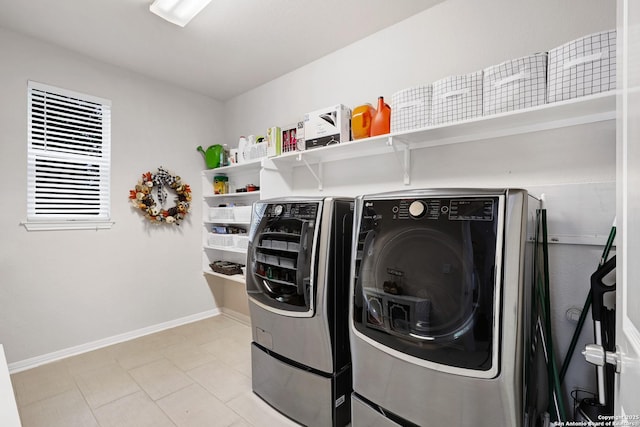 20607 Wild Spgs, San Antonio, TX 78258 - washroom featuring separate washer and dryer and baseboards