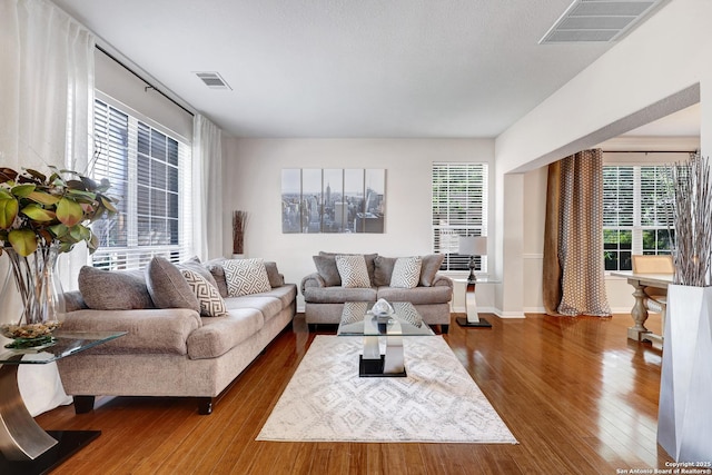 20607 Wild Spgs, San Antonio, TX 78258 - living area featuring wood finished floors and baseboards