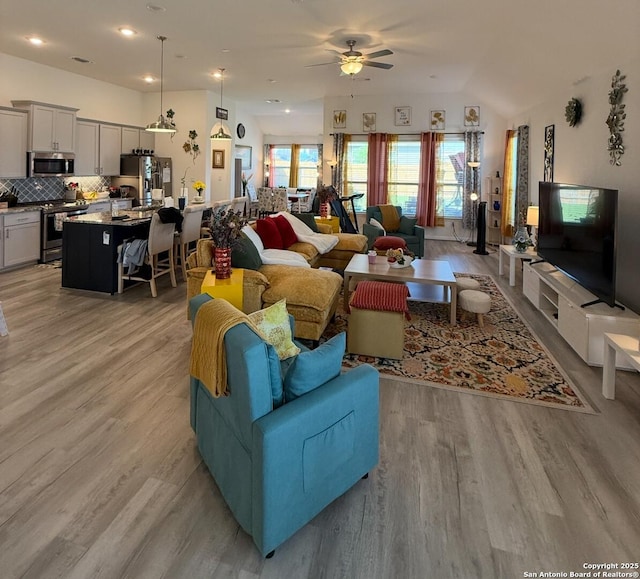 4919 Village Park, Marion, TX 78124 - living area with light wood finished floors, a ceiling fan, and recessed lighting