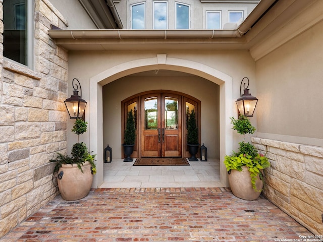 52 Oakland Hls, Boerne, TX 78006 - property entrance featuring french doors, stucco siding, and stone siding
