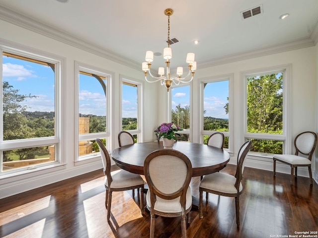 52 Oakland Hls, Boerne, TX 78006 - dining room with a chandelier, crown molding, and dark wood-style floors