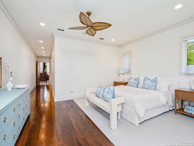 52 Oakland Hls, Boerne, TX 78006 - bedroom with dark wood-style flooring, ornamental molding, recessed lighting, a ceiling fan, and baseboards