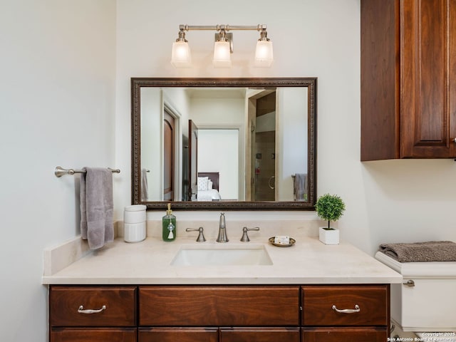 52 Oakland Hls, Boerne, TX 78006 - bathroom with vanity, an enclosed shower, and toilet
