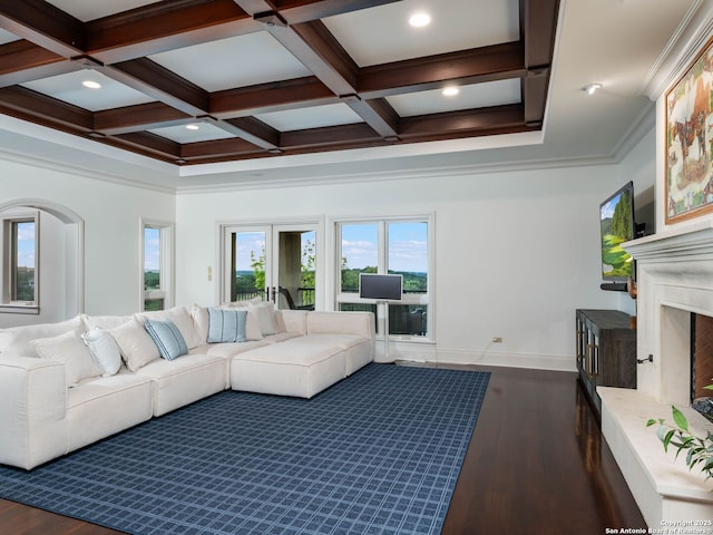 52 Oakland Hls, Boerne, TX 78006 - living area featuring dark wood finished floors, coffered ceiling, beamed ceiling, a fireplace with raised hearth, and recessed lighting
