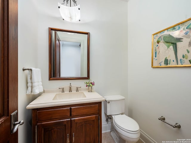 52 Oakland Hls, Boerne, TX 78006 - half bath with vanity, toilet, and baseboards