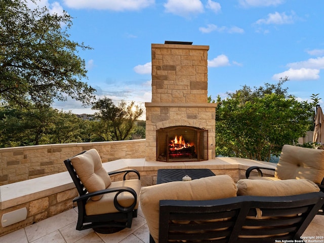 52 Oakland Hls, Boerne, TX 78006 - view of patio with an outdoor stone fireplace