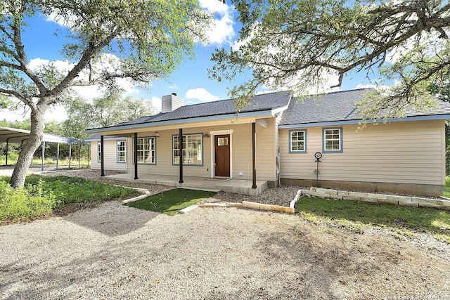 661 Abels Way, Canyon Lake, TX 78133 - single story home featuring a chimney and a porch