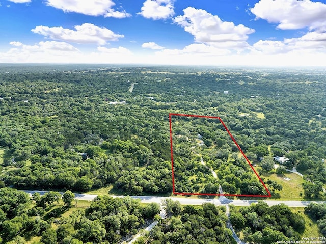 661 Abels Way, Canyon Lake, TX 78133 - aerial view of property's location with a heavily wooded area and property boundaries highlighted