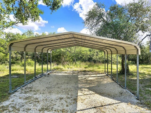 661 Abels Way, Canyon Lake, TX 78133 - view of parking featuring a detached carport