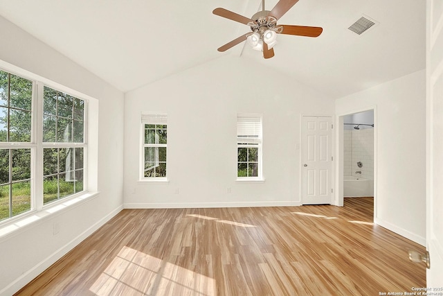 661 Abels Way, Canyon Lake, TX 78133 - spare room featuring plenty of natural light, light wood finished floors, baseboards, ceiling fan, and vaulted ceiling