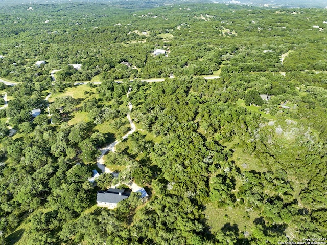 661 Abels Way, Canyon Lake, TX 78133 - aerial view of property and surrounding area featuring a heavily wooded area
